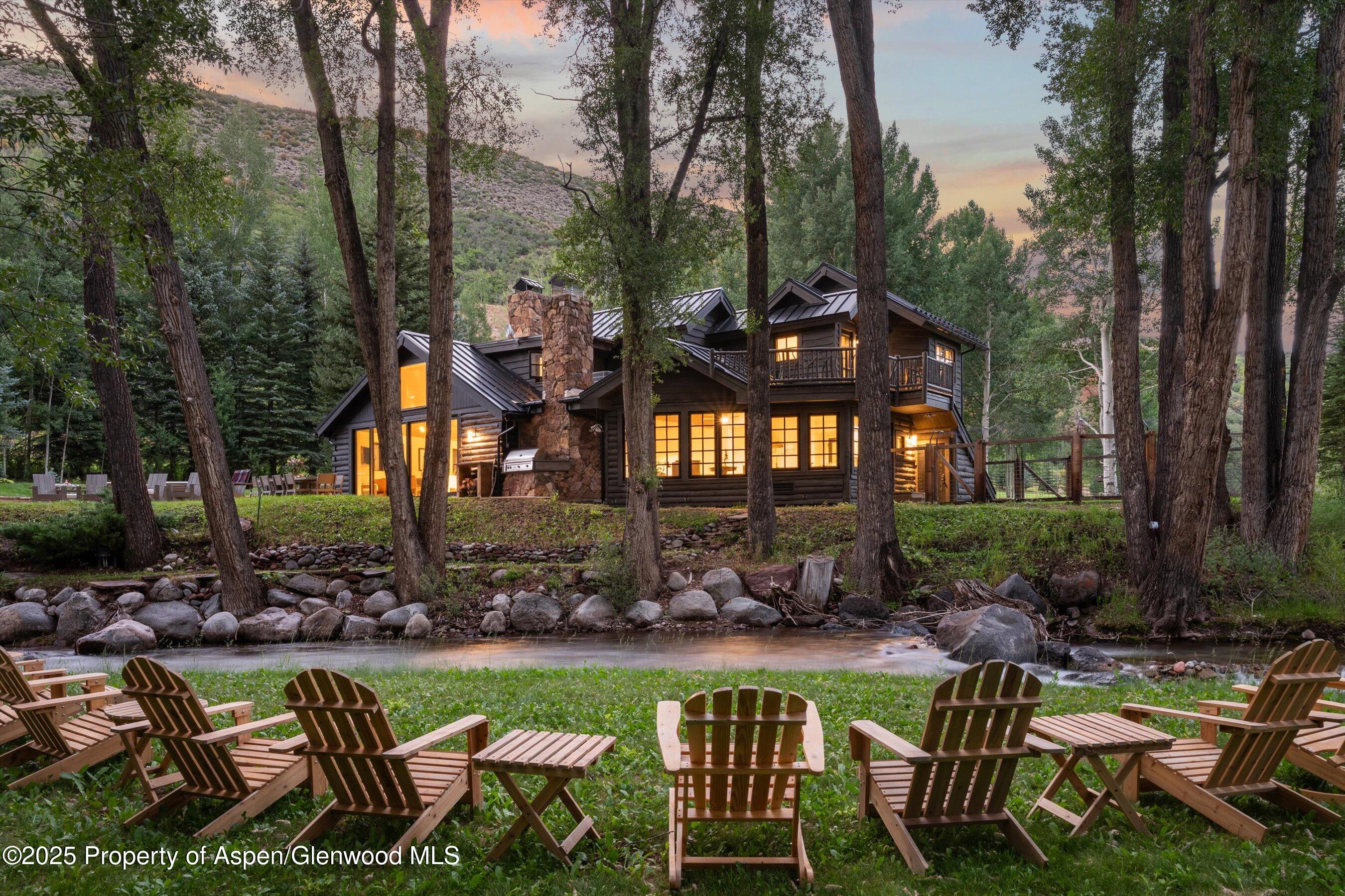 6458 Snowmass Creek Road Snowmass, CO 81654 - Photo 4 of 114 a view of a table and chairs in patio