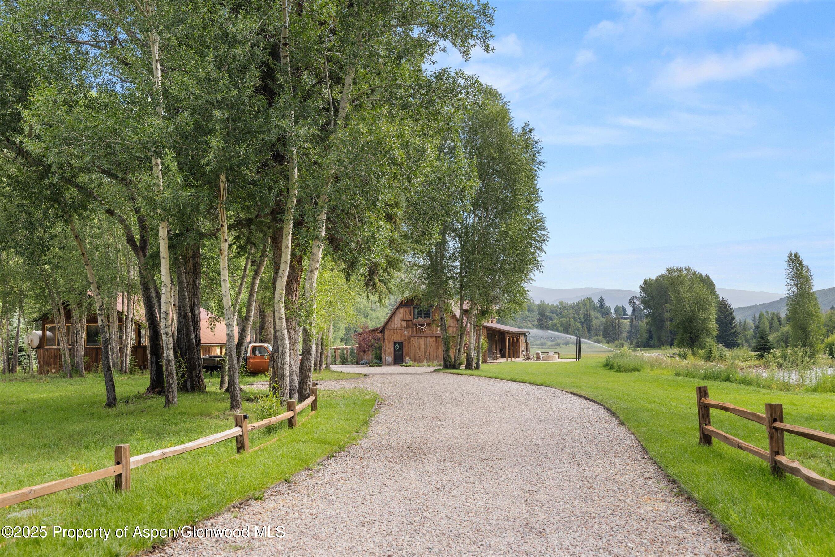 6458 Snowmass Creek Road Snowmass, CO 81654 - Photo 64 of 114 a view of a park with large trees