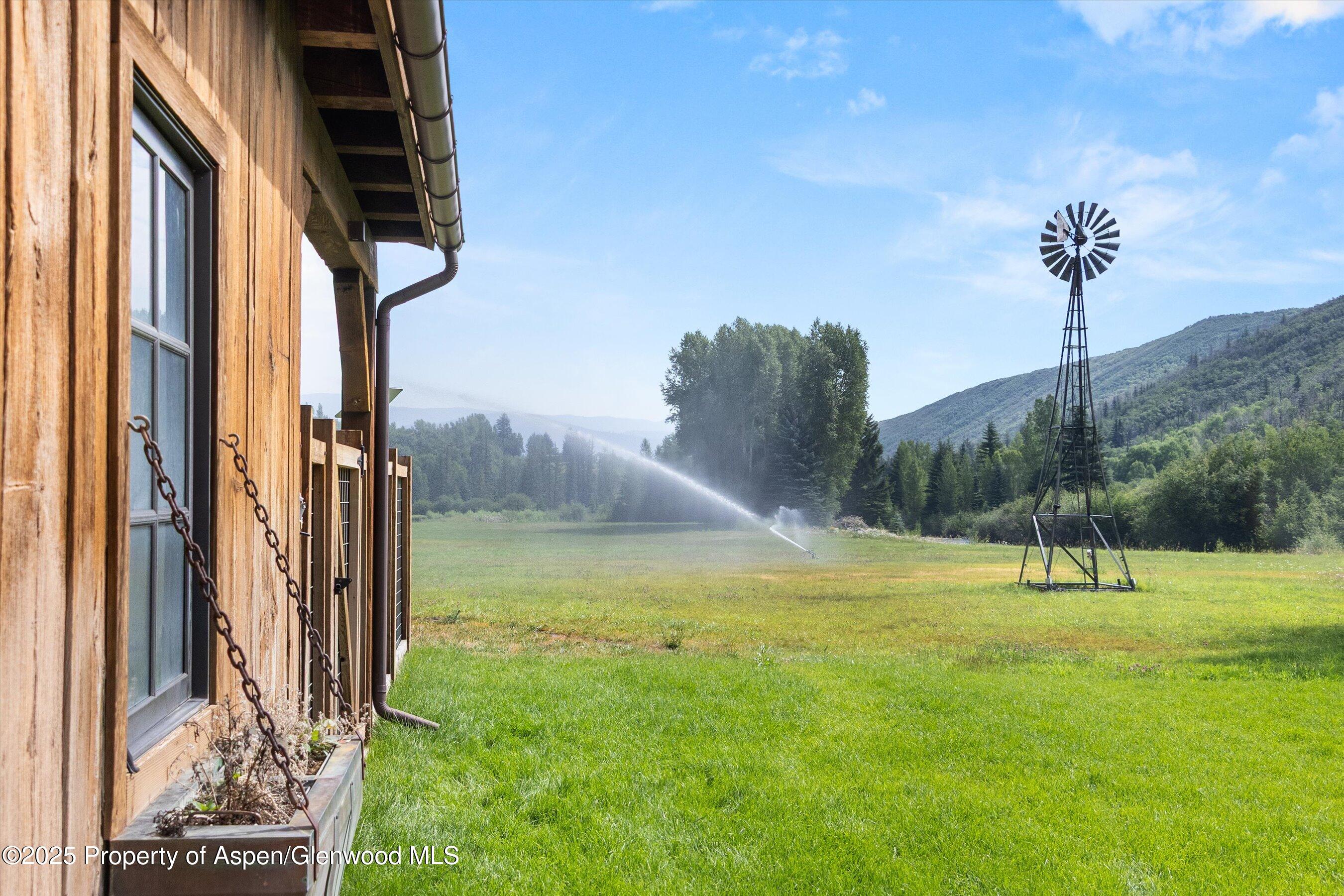 6458 Snowmass Creek Road Snowmass, CO 81654 - Photo 89 of 114 a view of a garden with a slide
