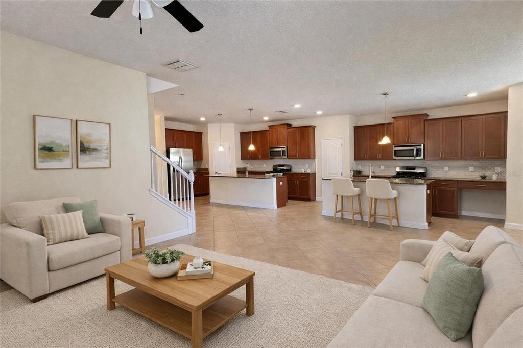 15401 Porter Road Winter Garden, FL 34787 - Photo 13 of 59 a living room with furniture kitchen view and a wooden floor