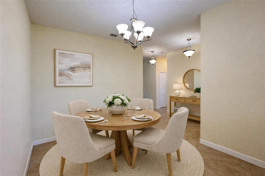 15401 Porter Road Winter Garden, FL 34787 - Photo 15 of 59 a view of a dining room with a table and chairs