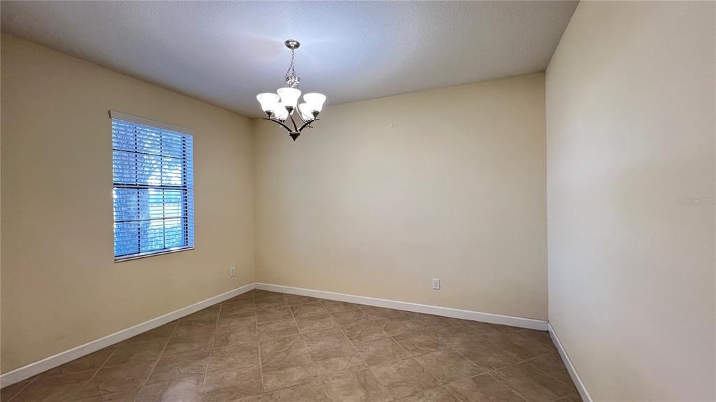 15401 Porter Road Winter Garden, FL 34787 - Photo 20 of 59 an empty room with a window