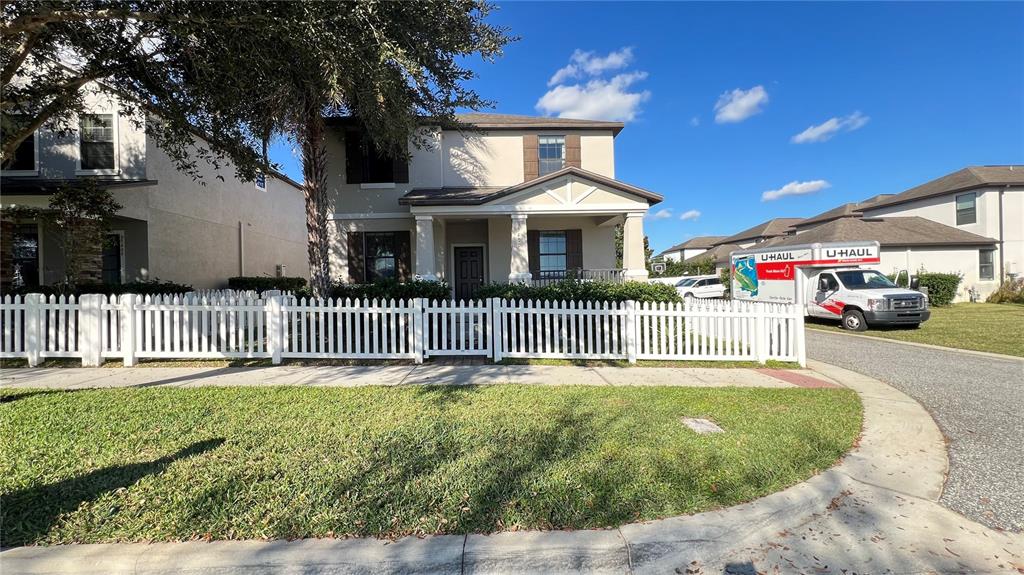 15401 Porter Road Winter Garden, FL 34787 - Photo 2 of 59 a front view of a house with a garden and deck