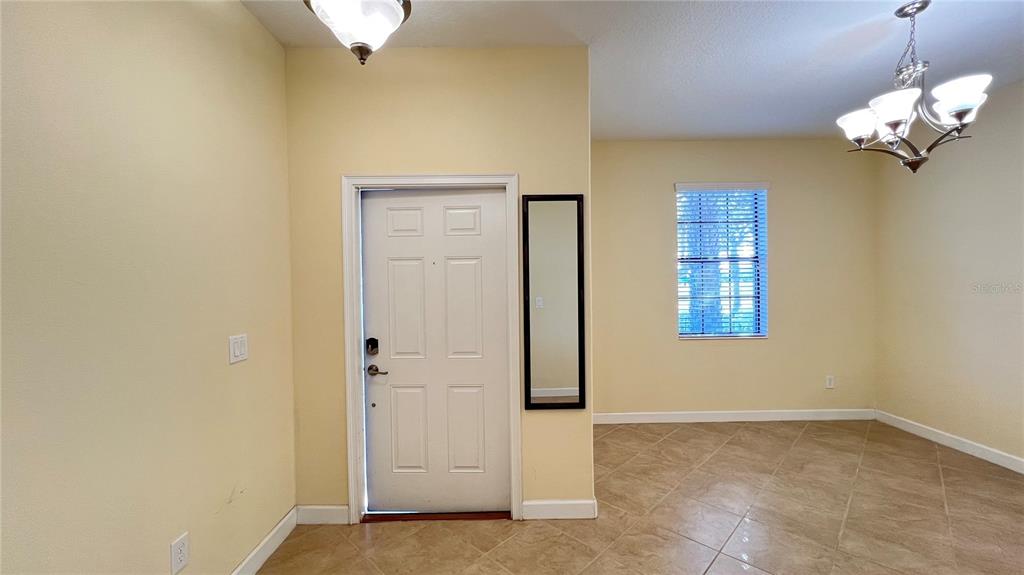 15401 Porter Road Winter Garden, FL 34787 - Photo 21 of 59 a view of a livingroom with a chandelier