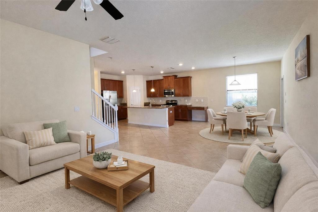 15401 Porter Road Winter Garden, FL 34787 - Photo 10 of 59 a living room with furniture and kitchen view