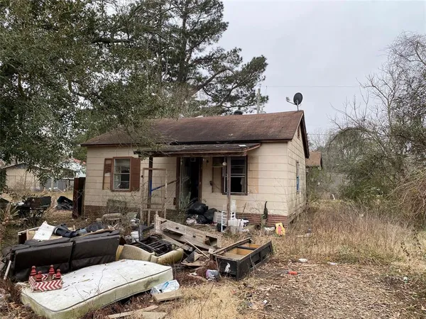 a view of a patio with couches and potted plants