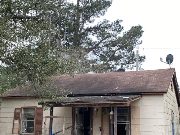 an outdoor space with wooden floor