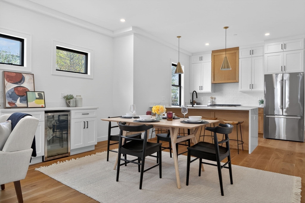 14 Hamlet Street, Unit A Somerville, MA 02143 - Photo 5 of 22 a view of a dining room with furniture