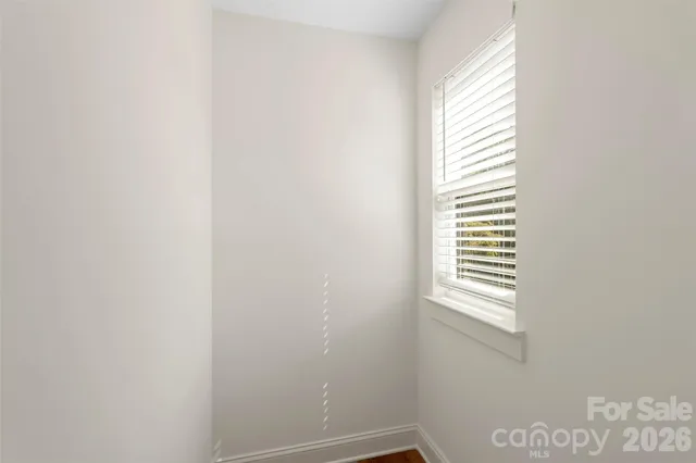 a view of a room that has a window in it