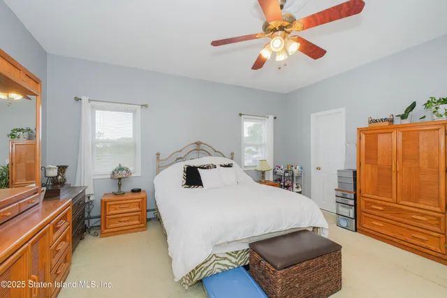 a bedroom with furniture and a bed