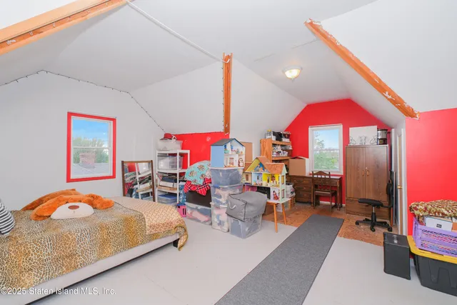 a bedroom with furniture and a bed