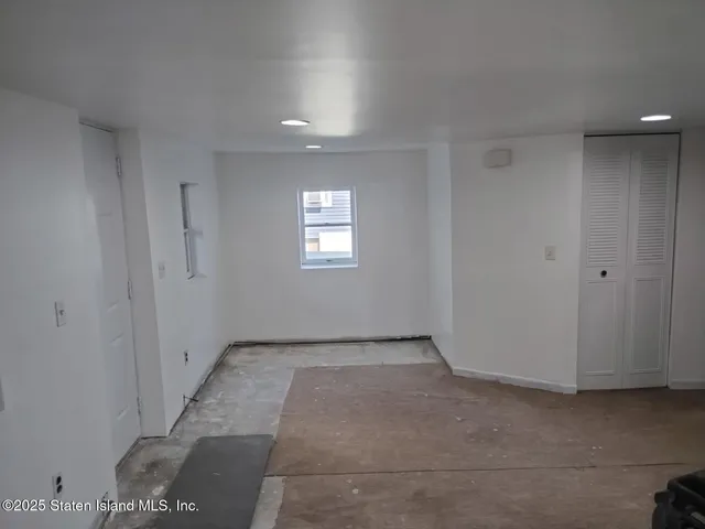 a view of a room with an empty space