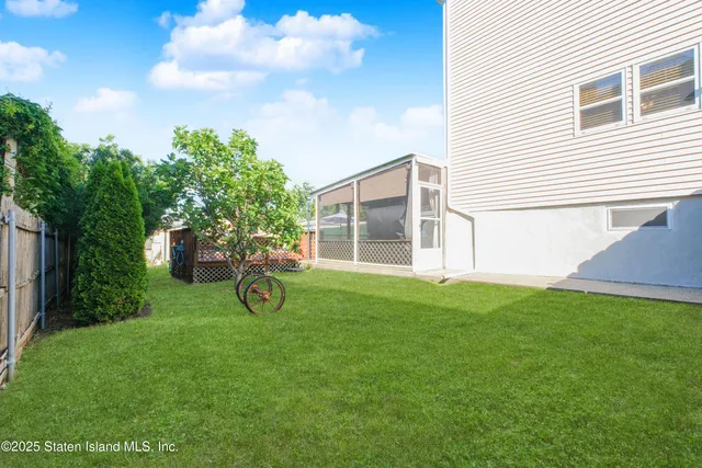 a view of a swimming pool with an outdoor seating
