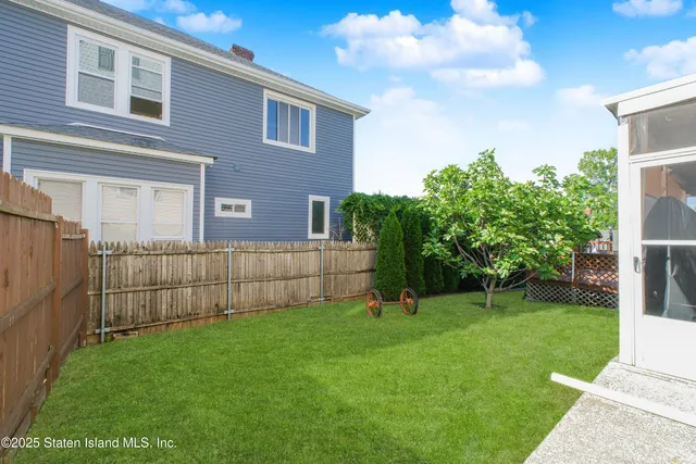 a outdoor dining space with furniture and outdoor view