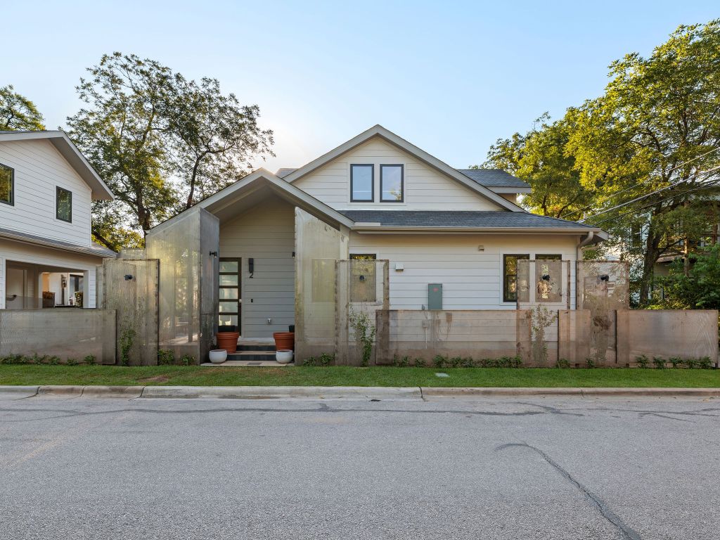 1401 East 3rd Street, Unit 2 Austin, TX 78702 - Photo 5 of 31 View of front of house featuring a shingled roof