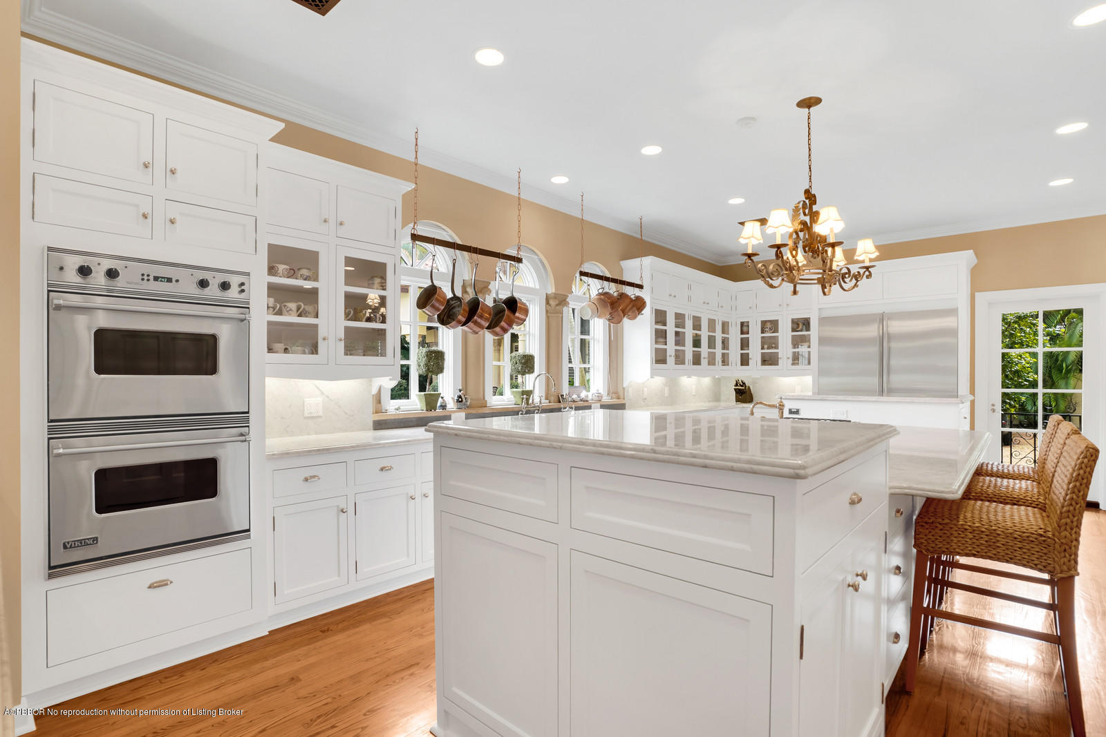 258 Wells Road Palm Beach, FL 33480 - Photo 8 of 18 a kitchen with stainless steel appliances kitchen island granite countertop a stove and white cabinets