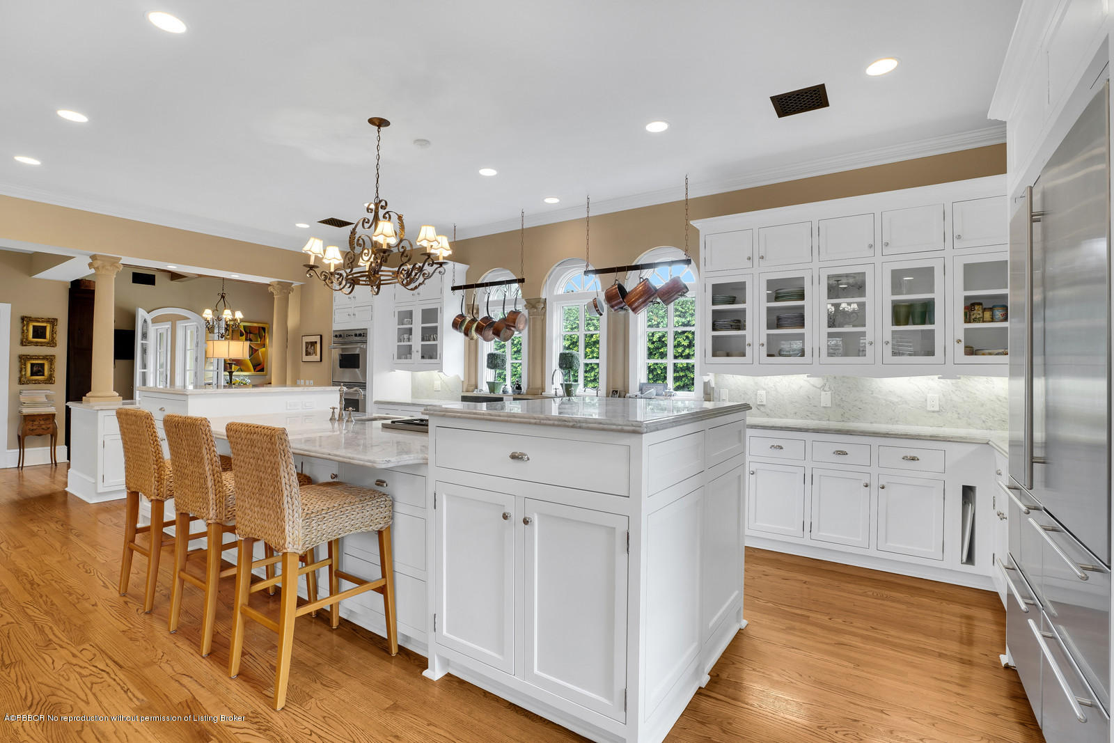 258 Wells Road Palm Beach, FL 33480 - Photo 9 of 18 a kitchen with stainless steel appliances kitchen island granite countertop a table and chairs