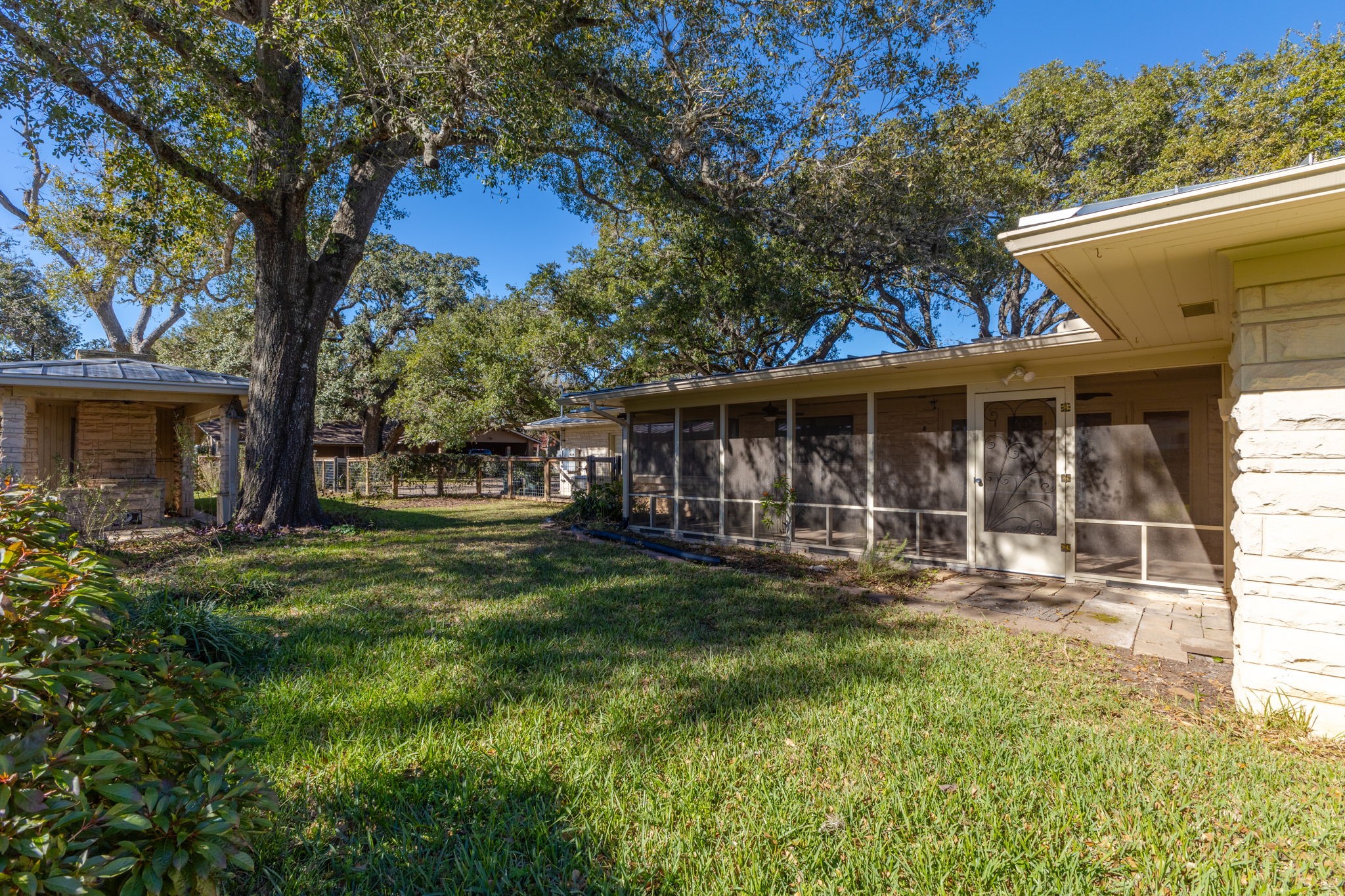 301 Bonham Street Columbus, TX 78934 - Photo 36 of 44 a front view of a house with a garden