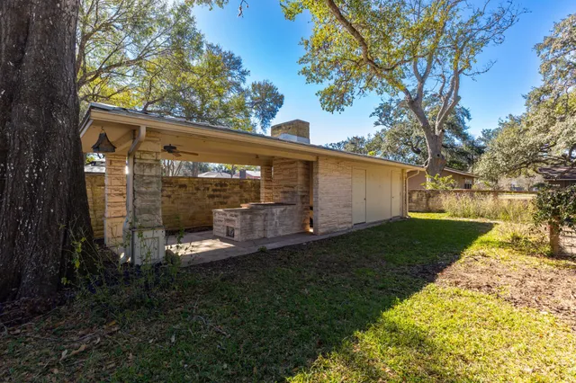 a view of a back yard with green space
