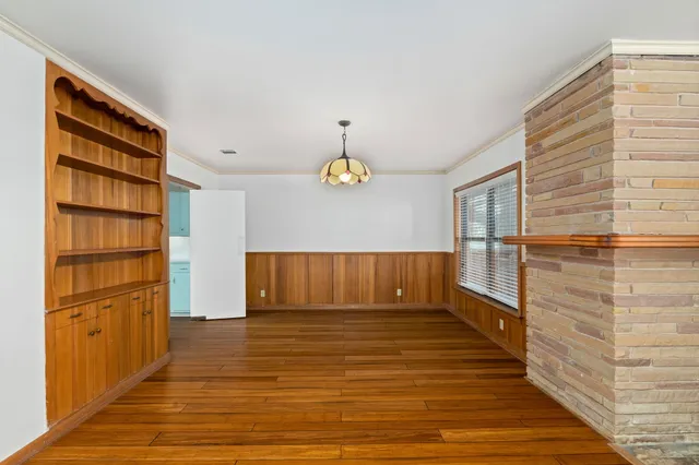 a view of workspace with wooden floor