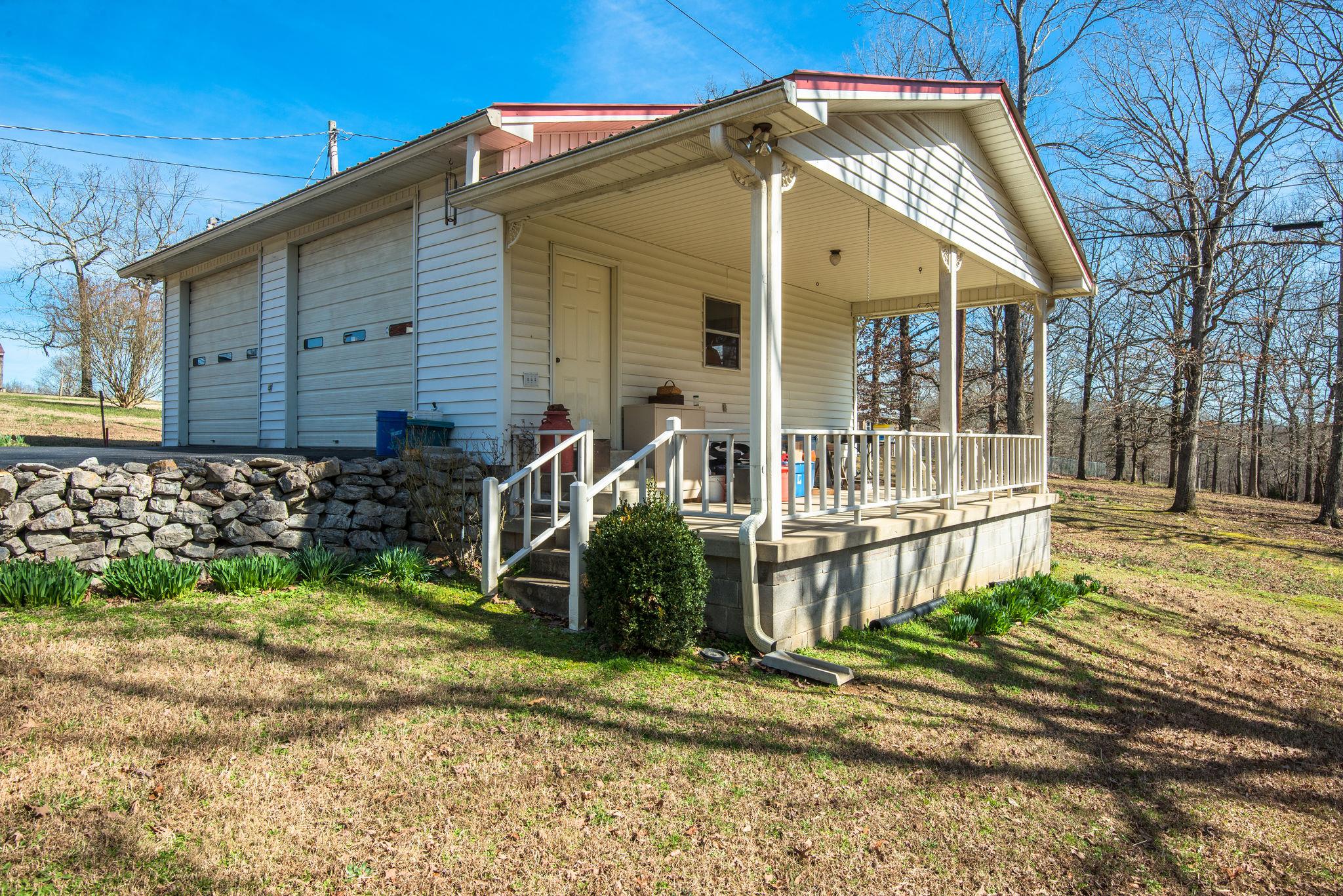 128 Robert Porter Road Dickson, TN 37055 - Photo 24 of 27 Detached Large 2 Car Garage w/ Covered Deck