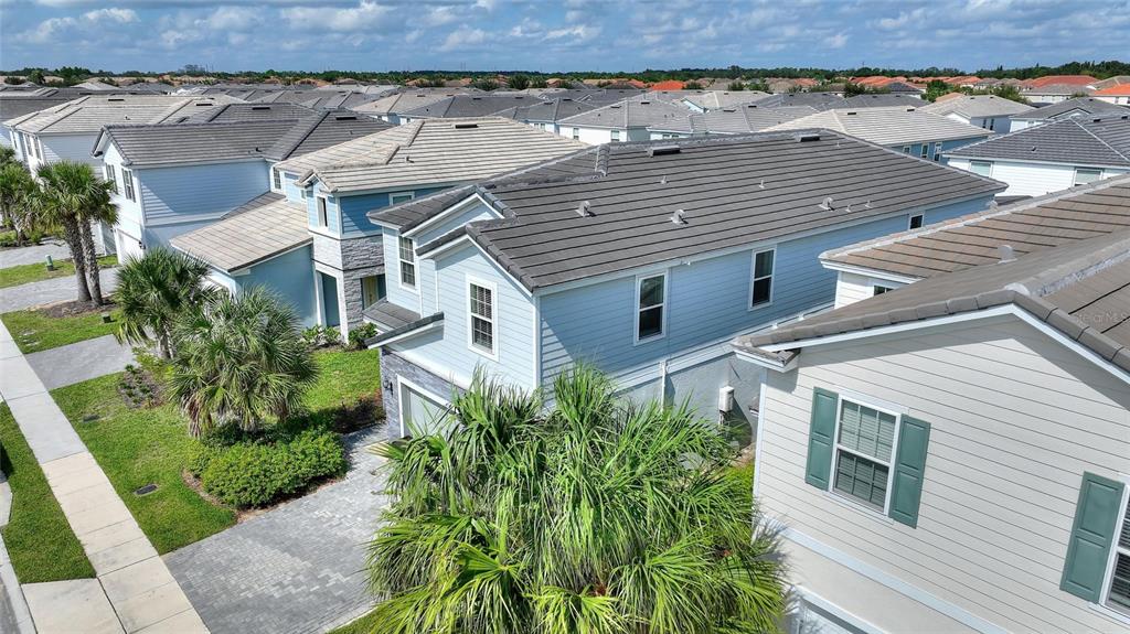 7380 Oakmoss Loop Davenport, FL 33837 - Photo 54 of 84 an aerial view of a house with a yard