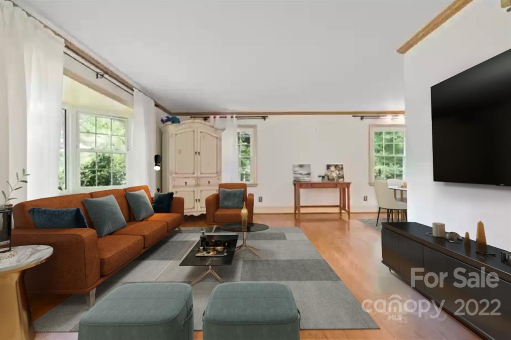 1024 Timber Lake Drive Charlotte, NC 28227 - Photo 6 of 34 a living room with furniture and a flat screen tv