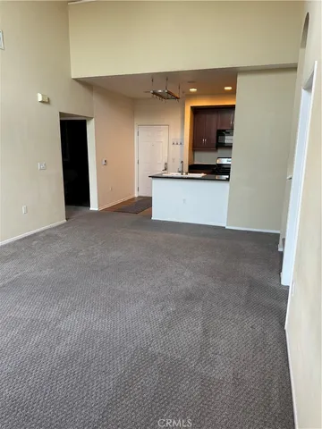 a view of a kitchen with a sink