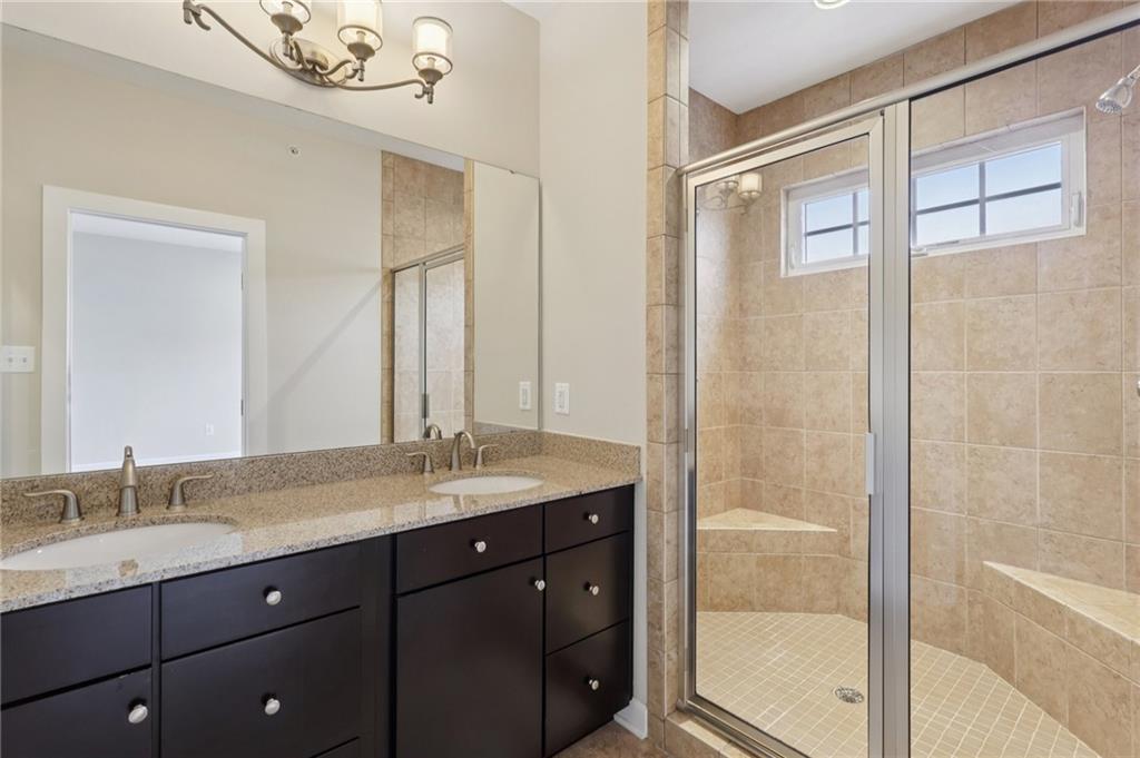 228 Venango Trail Mars, PA 16046 - Photo 16 of 41 a bathroom with a granite countertop sink mirror and double