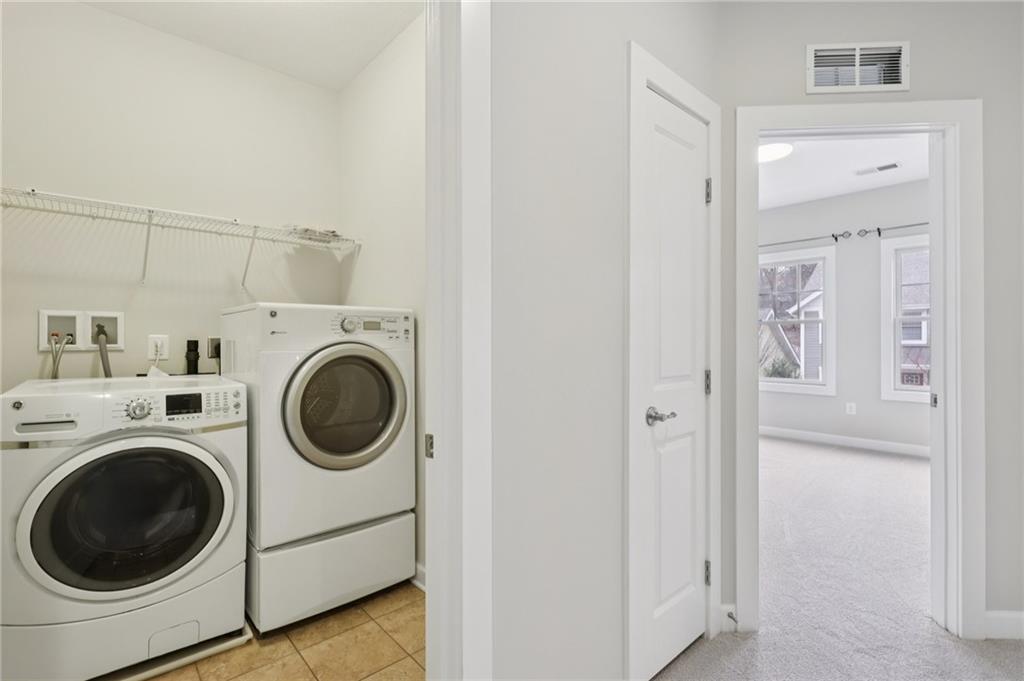 228 Venango Trail Mars, PA 16046 - Photo 22 of 41 a utility room with dryer and washer