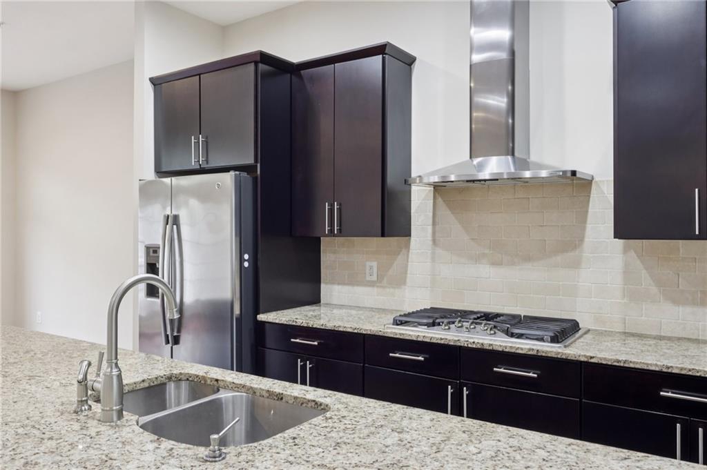 228 Venango Trail Mars, PA 16046 - Photo 8 of 41 a kitchen with stainless steel appliances granite countertop a sink stove and refrigerator