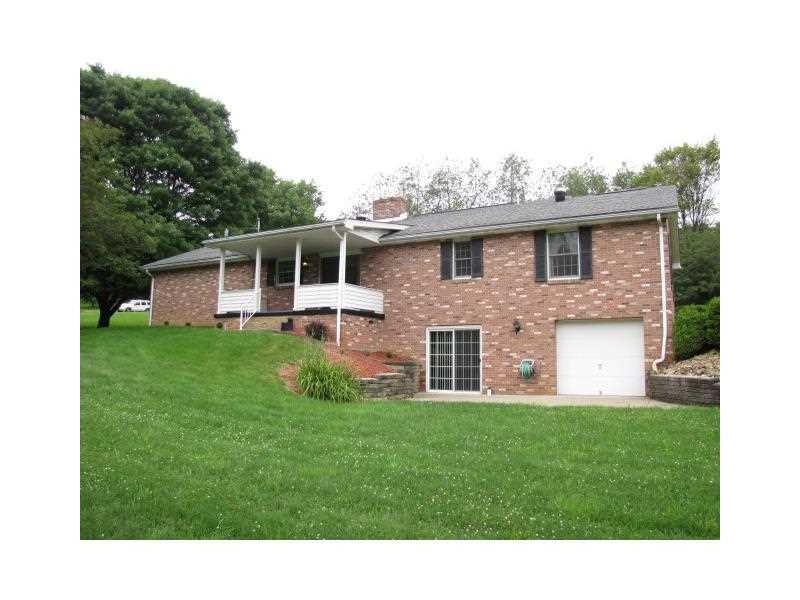 190 Reesedale Road Kittanning, PA 16201 - Photo 3 of 12 Exterior Back. Rear of home features a covered porch and patio area accessed from the family room.