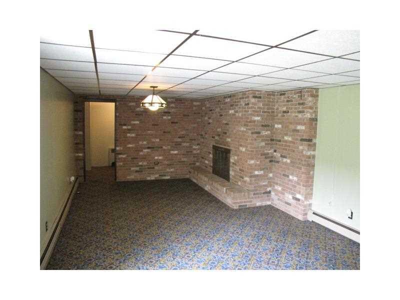 190 Reesedale Road Kittanning, PA 16201 - Photo 10 of 12 Family Room. Huge game room in basement features 2nd fireplace