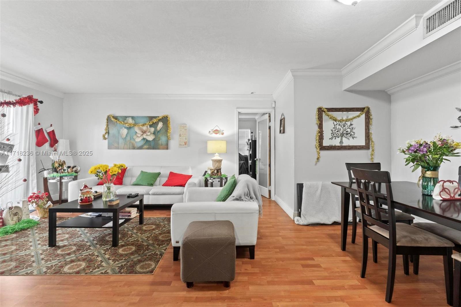 10755 Southwest 108th Avenue, Unit 301 Miami, FL 33176 - Photo 9 of 23 a living room with furniture and wooden floor
