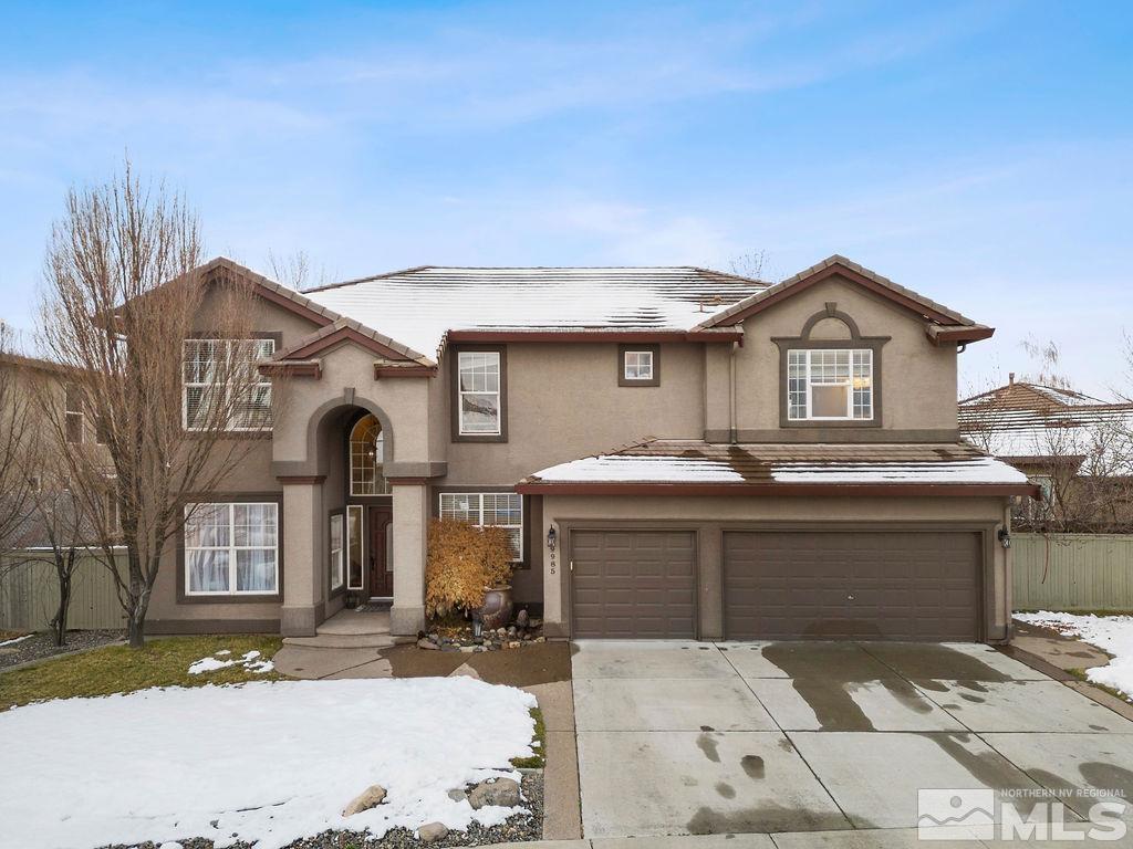 9985 Moccasin Court Reno, NV 89521 - Photo 1 of 40 a front view of a house with a yard