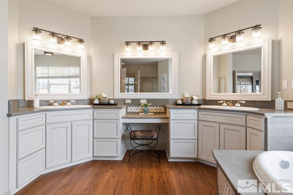 9985 Moccasin Court Reno, NV 89521 - Photo 34 of 40 a kitchen with a sink cabinets and wooden floor