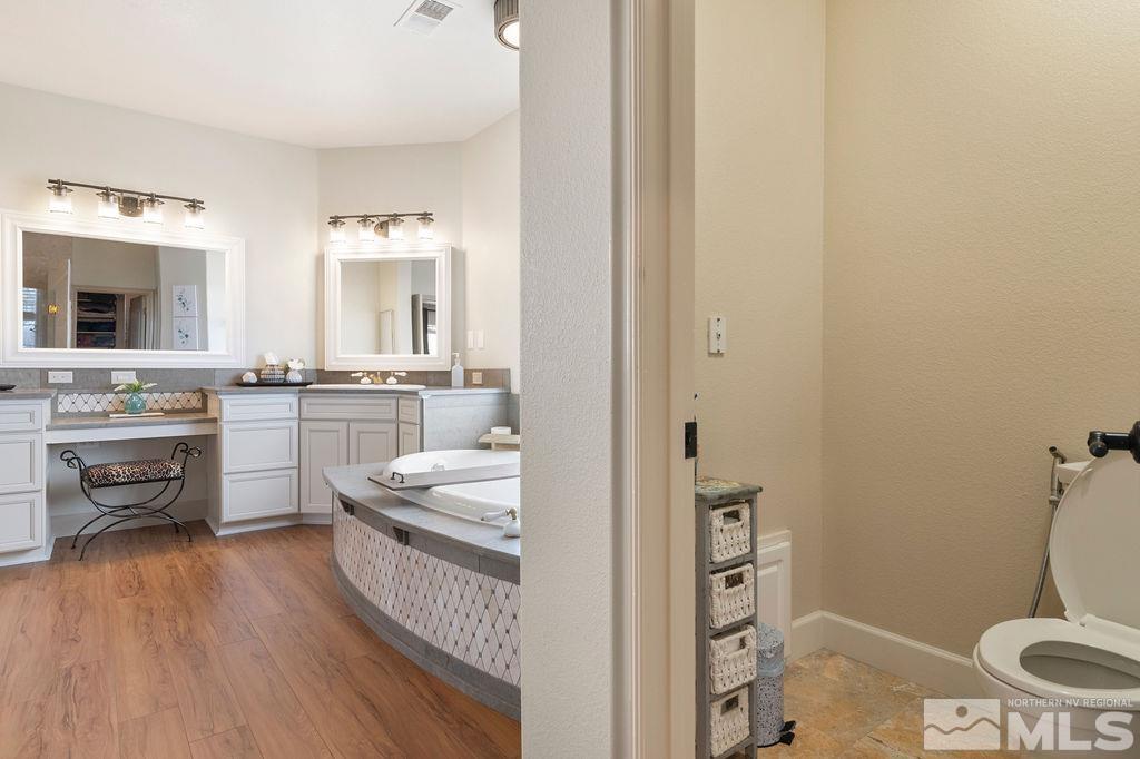 9985 Moccasin Court Reno, NV 89521 - Photo 36 of 40 a kitchen with a sink appliances and cabinets