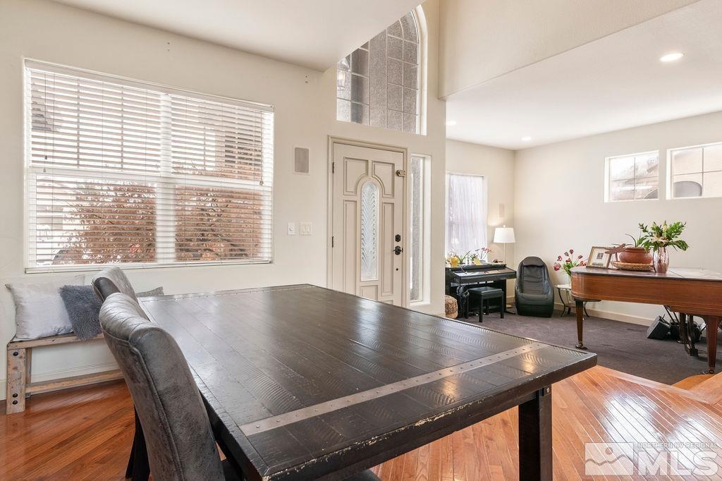9985 Moccasin Court Reno, NV 89521 - Photo 5 of 40 a view of a dining room with furniture and a large window