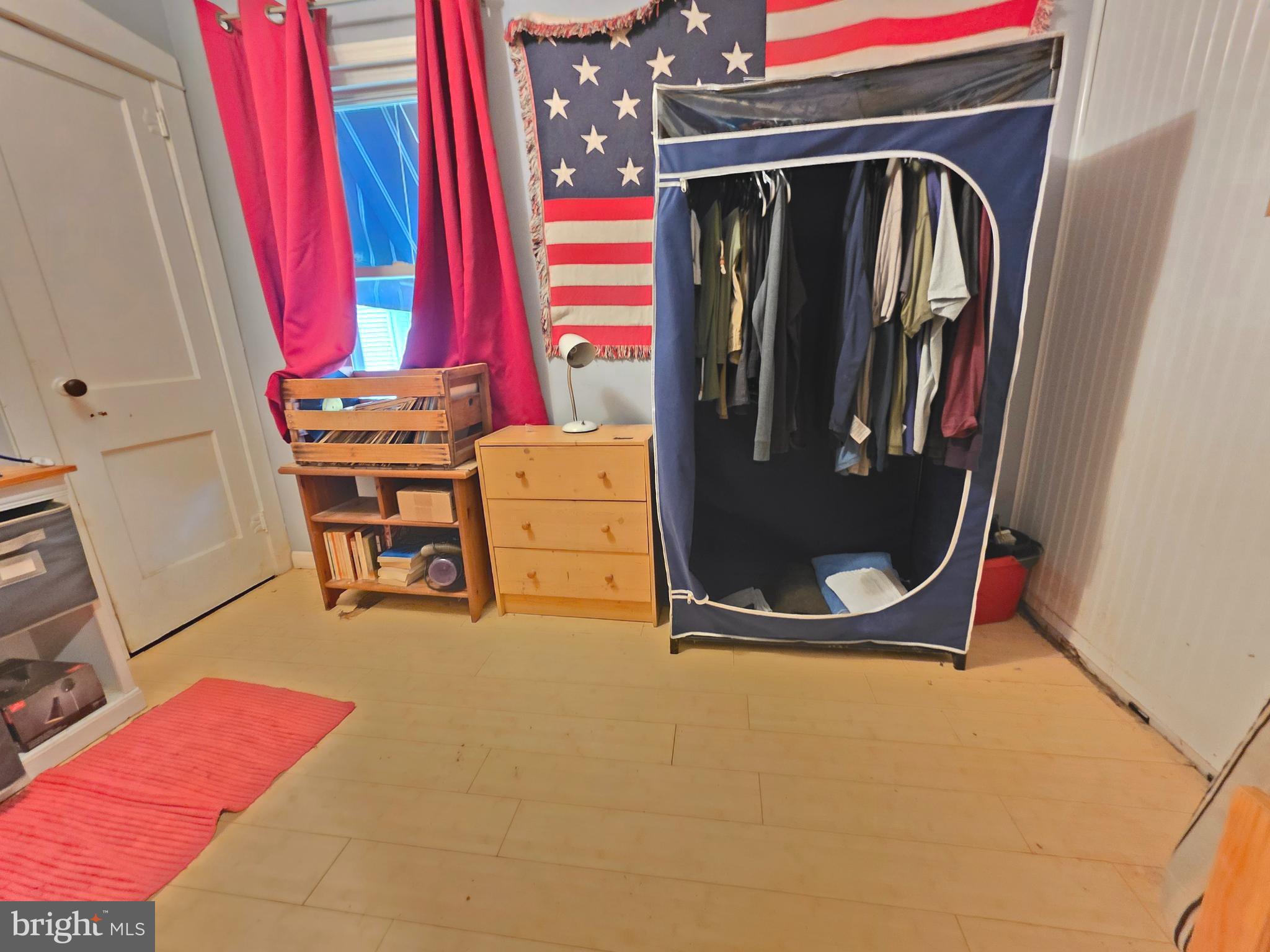 53 Valley Road Mount Ephraim, NJ 08059 - Photo 19 of 21 a view of a room with furniture and clothes