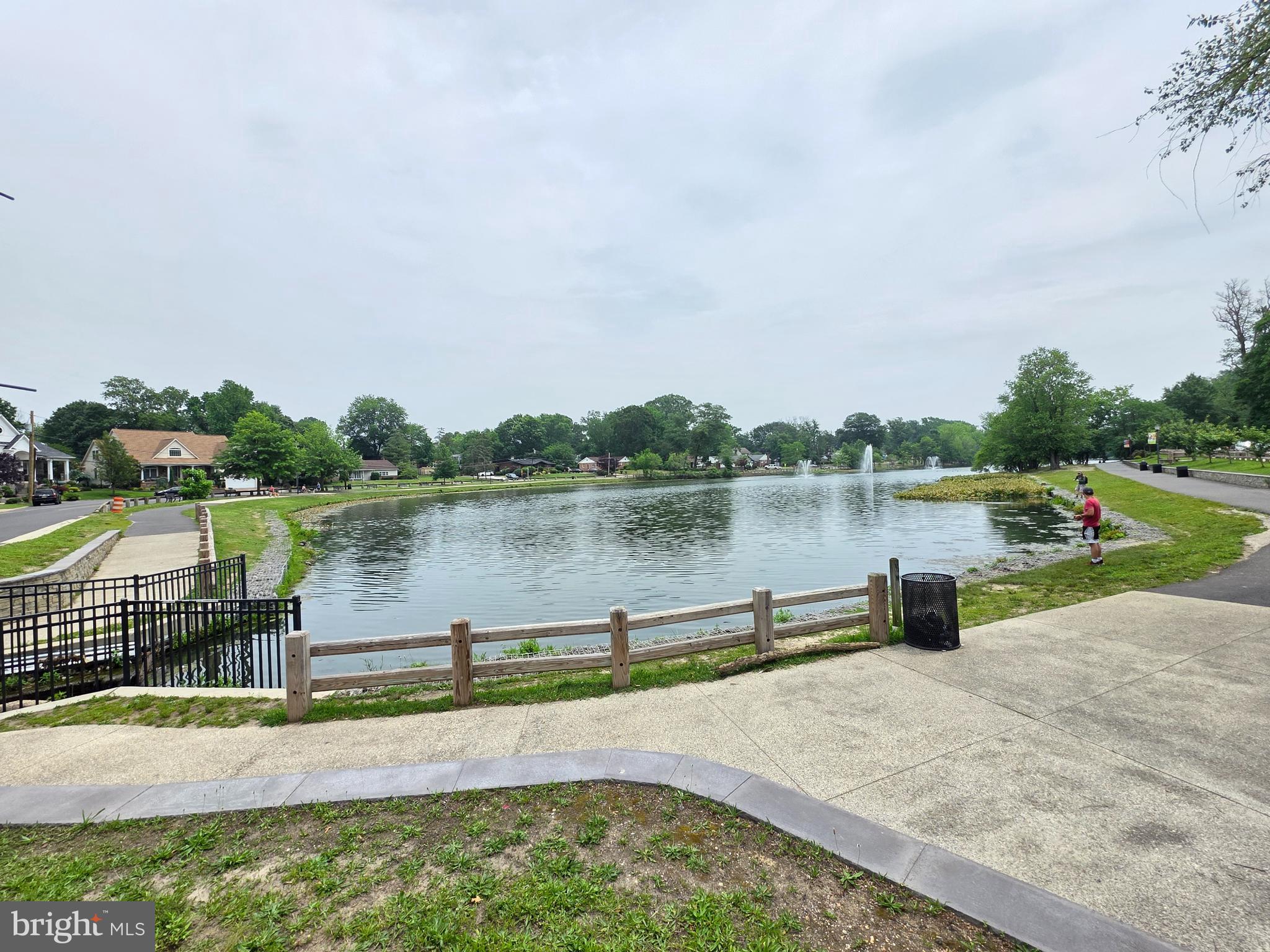 53 Valley Road Mount Ephraim, NJ 08059 - Photo 6 of 21 a view of a lake with a yard and large trees