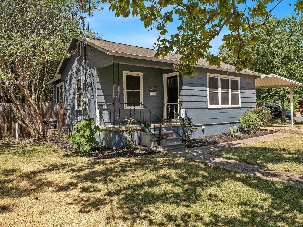 6308 Hall Street Austin, TX 78757 - Photo 1 of 1 a view of house with backyard space and sitting area
