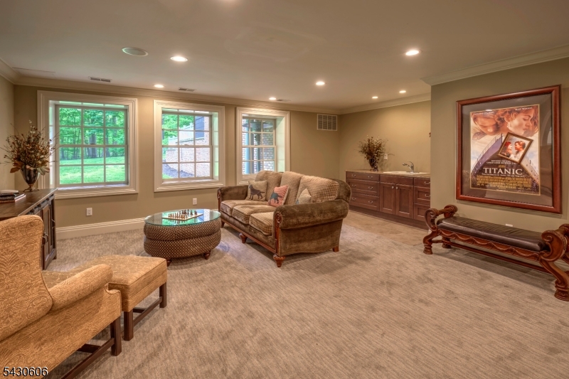5 Burnett Road Mendham, NJ 07945 - Photo 38 of 50 a living room with furniture and a large window