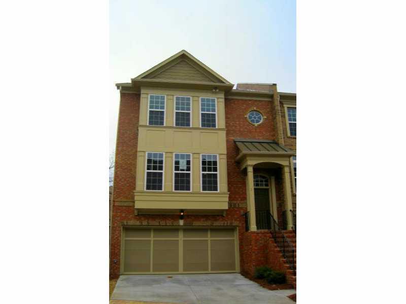 Exterior Front. Gorgeous brick exterior with double bay window for additional square footage