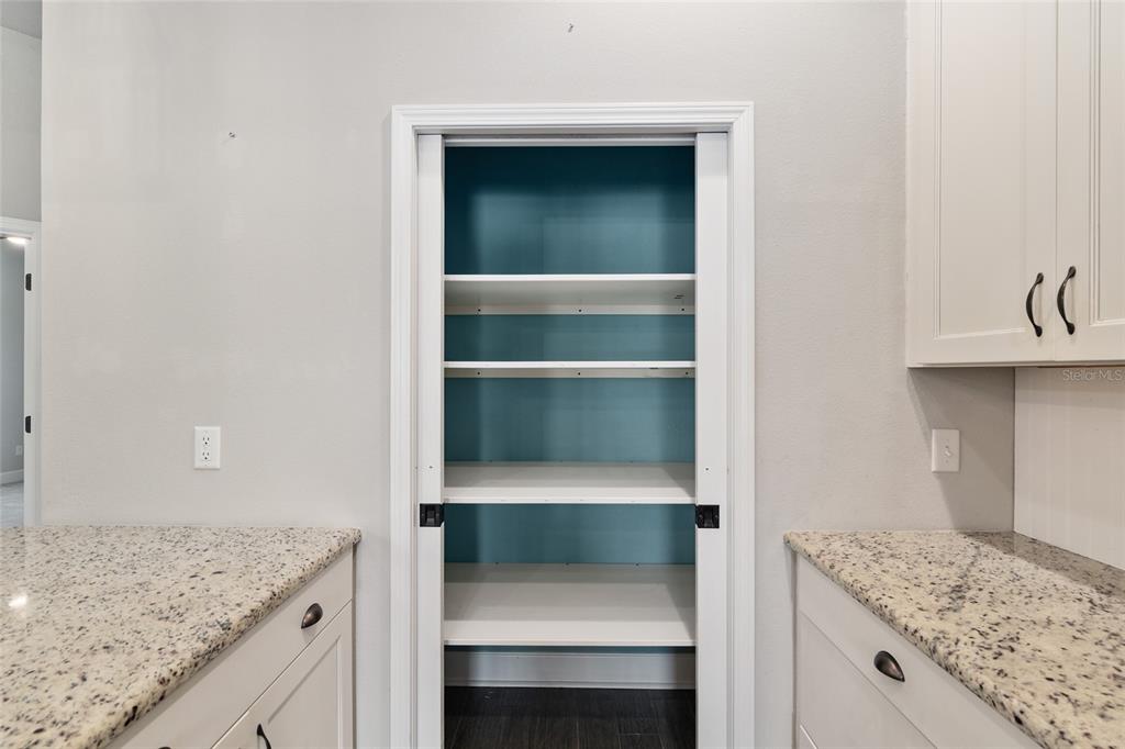 2556 Southwest 118th Terrace Gainesville, FL 32608 - Photo 24 of 72 a kitchen with a sink and cabinets