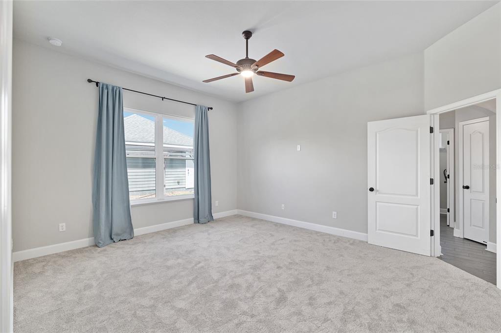 2556 Southwest 118th Terrace Gainesville, FL 32608 - Photo 30 of 72 a view of an empty room with a window