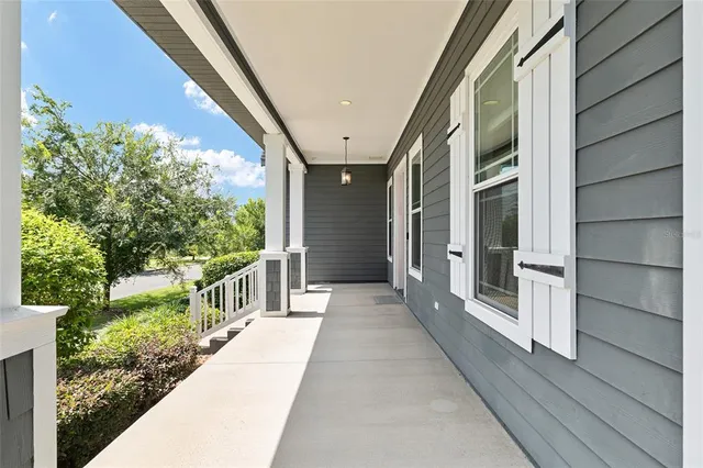 a front view of a house with outdoor shower