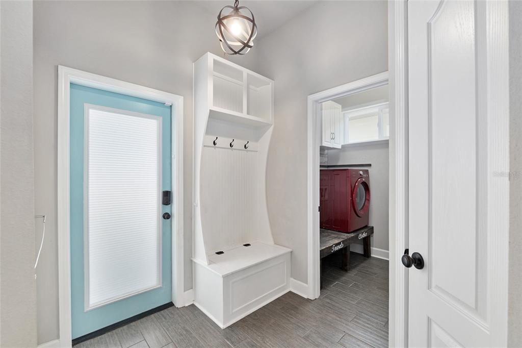 2556 Southwest 118th Terrace Gainesville, FL 32608 - Photo 45 of 72 a room that has a bed and a chair in it