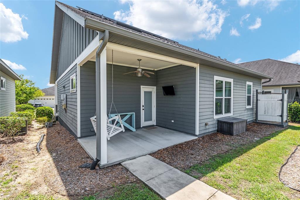 2556 Southwest 118th Terrace Gainesville, FL 32608 - Photo 50 of 72 a front view of a house with a yard