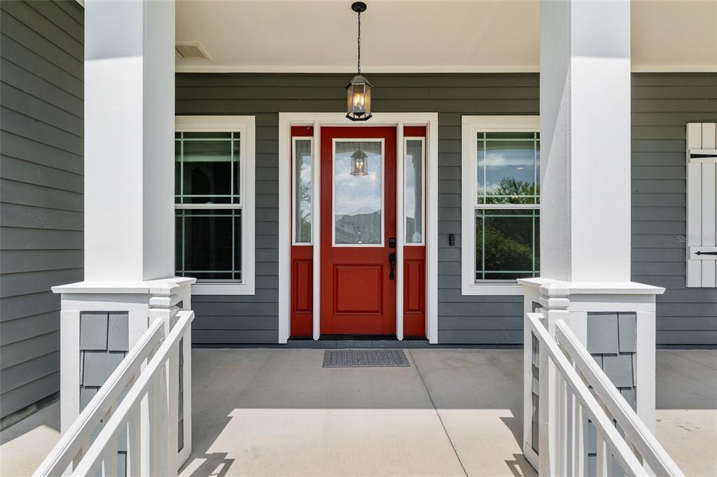 2556 Southwest 118th Terrace Gainesville, FL 32608 - Photo 5 of 72 a front view of a house with outdoor shower