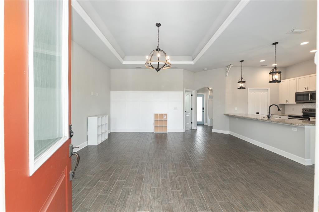 2556 Southwest 118th Terrace Gainesville, FL 32608 - Photo 8 of 72 a view of a kitchen with a sink and a window